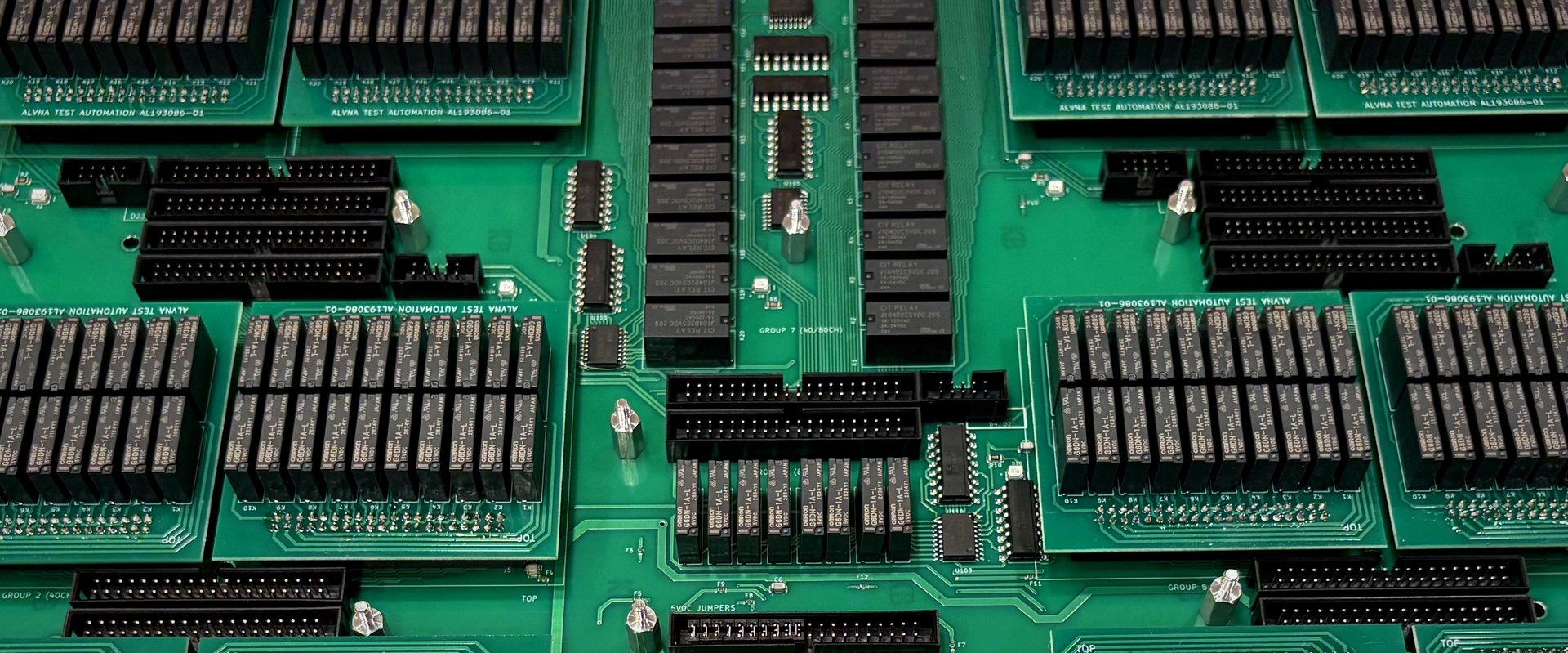 Close-up of ALVNA relay control board with labeled channel groups